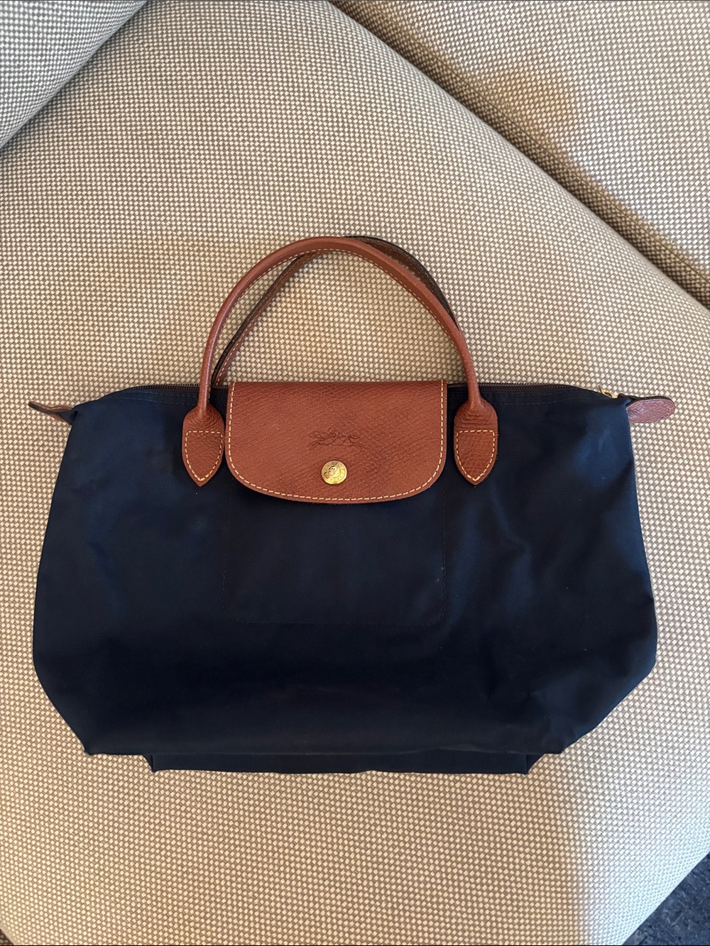 Longchamp navy canvas tote with brown leather trim